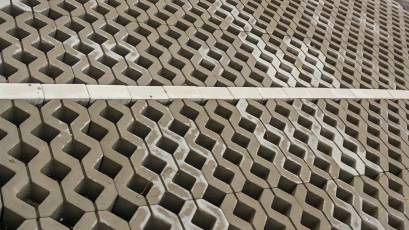 Paving stones continue to be arranged