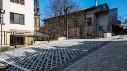 Paving stones have been laid on the adjoining territory